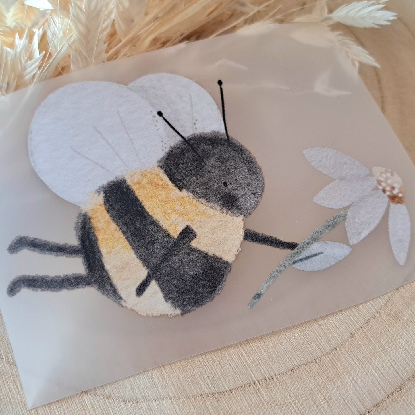 Bügelbild Biene mit Blume